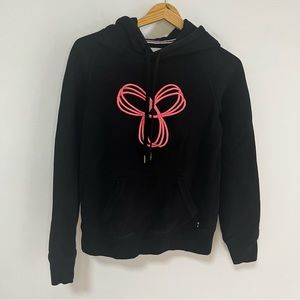 TNA Hoodie Black with Large pink Logo on chest size small
